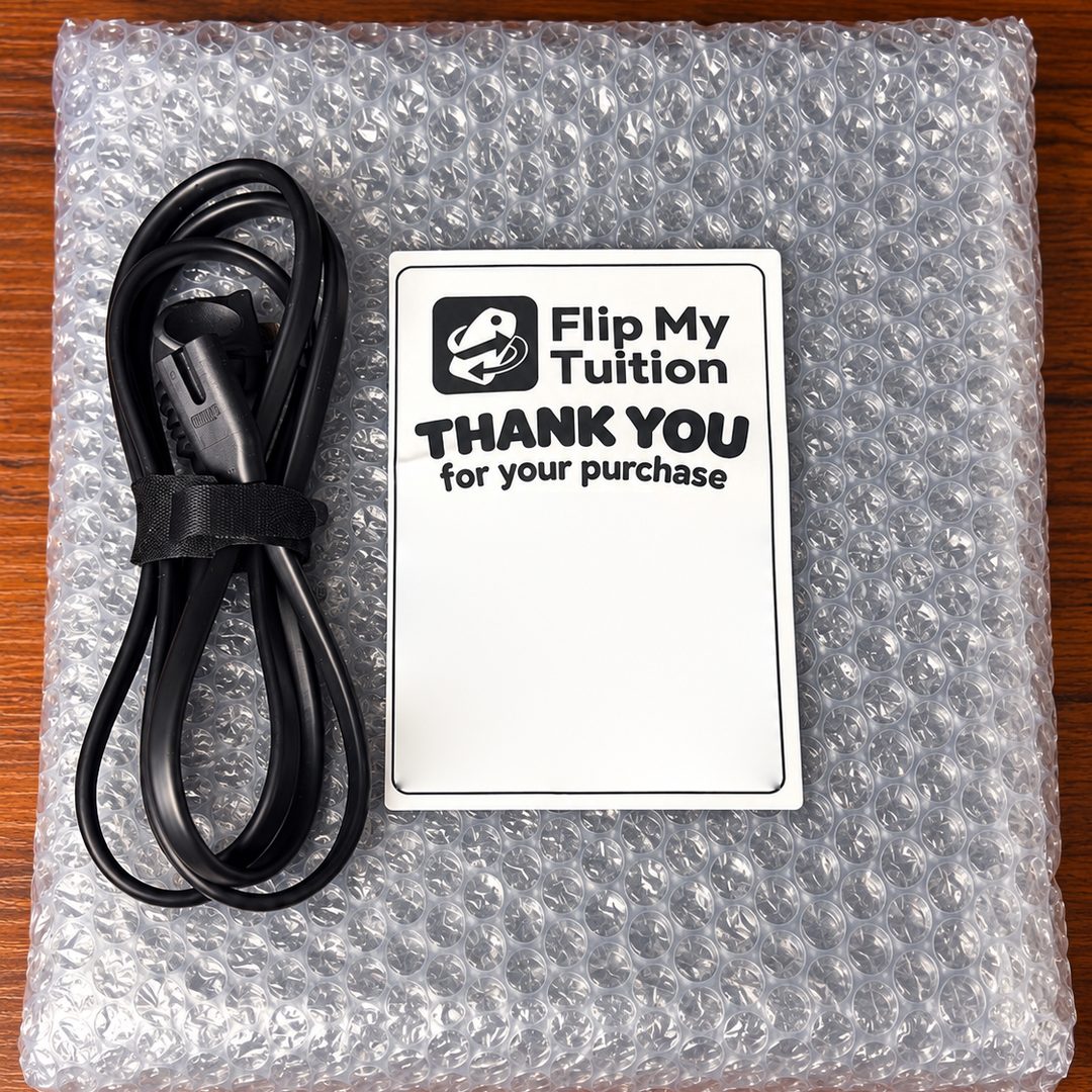 Example of how we pack an order: a bubble-wrapped console, a neatly tied power cable, and a Flip My Tuition thank-you card